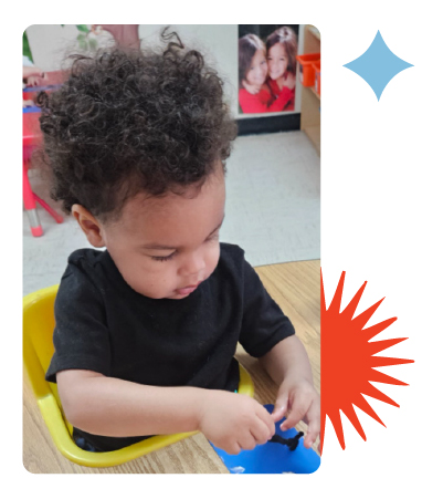 Toddlers eating healthy meal at Learning Center Live Oak daycare San Antonio Texas