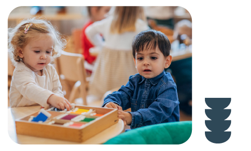 Toddlers using learning materials at Learning Center Live Oak developing cognitive skills