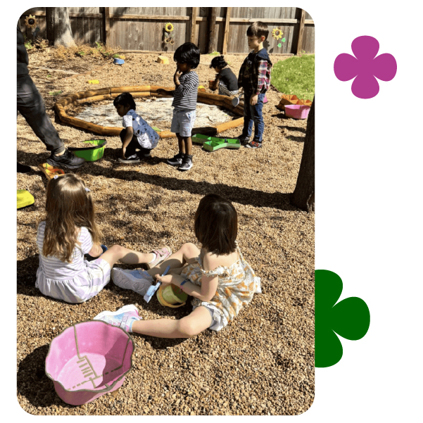 Toddlers playing in natural playground at Learning Center Live Oak daycare San Antonio