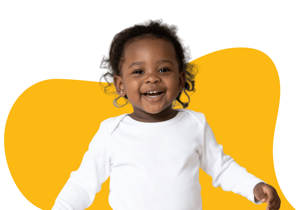 Happy toddler smiling at Learning Center Live Oak toddler program San Antonio Texas