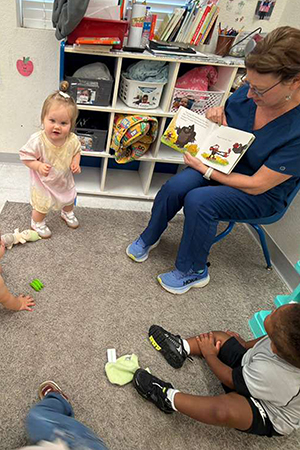 Children listening to storytime at early literacy daycare Kerrville