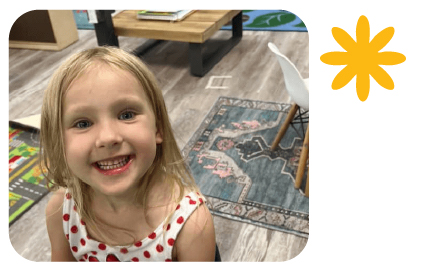 Joyful Learning – Live Oak Smiling preschool child at Learning Center Live Oak enjoying classroom activities